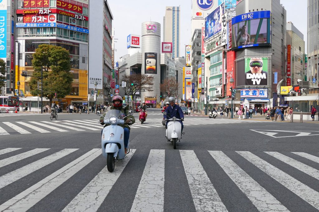 Riding through Shibuya Crossing with Vespa Club of Tokyo.